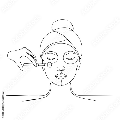 Continuous one line drawing of a woman with a towel on her head getting a facial mask treatment at a spa.
