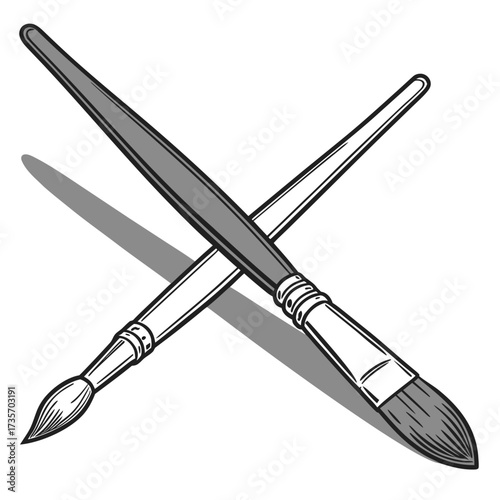 Two crossed paint brushes with a shadow representing art and creativity
