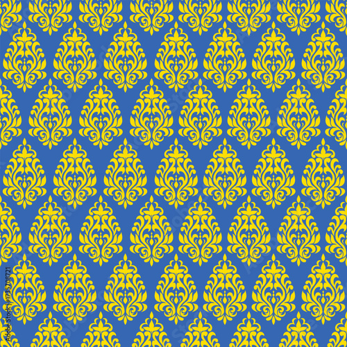 Deep blue backdrop accented by vivid yellow elements in a precise, orderly arrangement, delivering a sense of luxury and energy through bold color contrast.