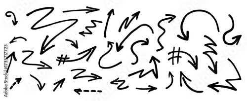 Graffiti arrow set in vector style black strokes made with ink or chalk, paintbrush, crayon and charcoal. Bold comic drawing collection of comic drawing elements for street graffity collage