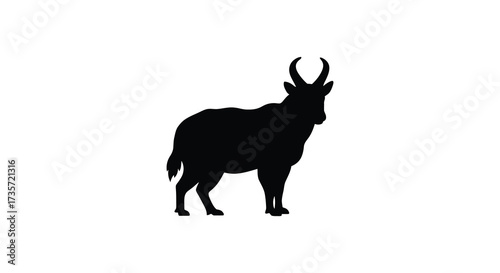 Silhouette of an antelope with curved horns against a white backdrop
