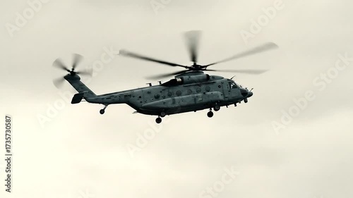 Wallpaper Mural Helicopter in flight against a cloudy sky, aerial view of aircraft. Torontodigital.ca