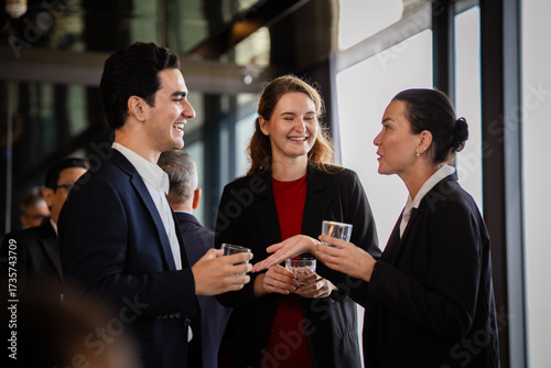 Business leaders networking in a relaxed setting, showcasing trust, creativity, and professional relationship building. Smile corporate team members enjoying after-work drinks.