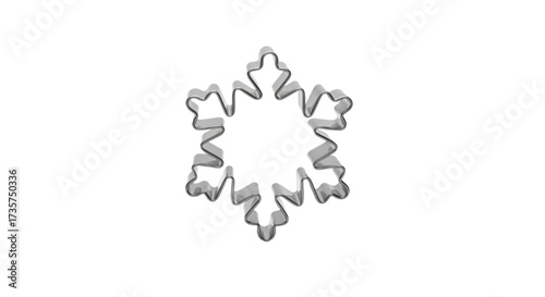 Simple snowflake cookie cutter isolated on a white background, perfect for holiday baking and winter crafts.