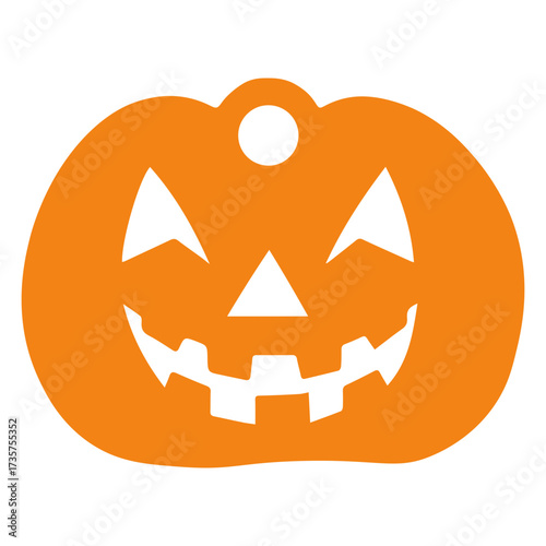 Orange jack o lantern with a cutout face and a small white circle at the top for hanging decoration