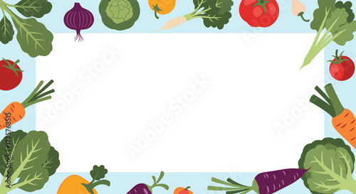 A vibrant frame of fresh vegetables surrounding a blank space for text.