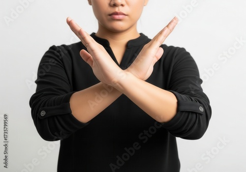 Woman Demonstrates Boundary with Crossed Arms