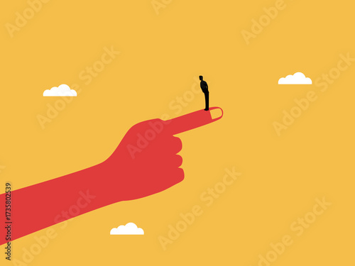 Businessman looks opposite with hand pointing in direction