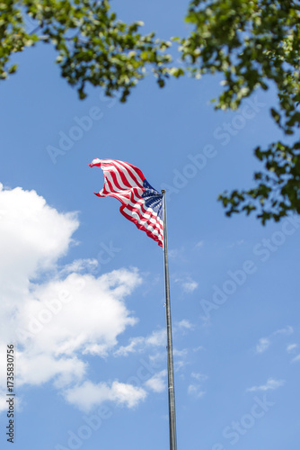American flag against blue sky