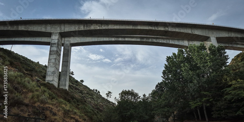 Bridge over the Tinhela River belonging to the A4 highway near Murça, Tras-os-Montes, Portugal, august 2025. This robust infrastructure connects northern regions and enhances local mobility.
