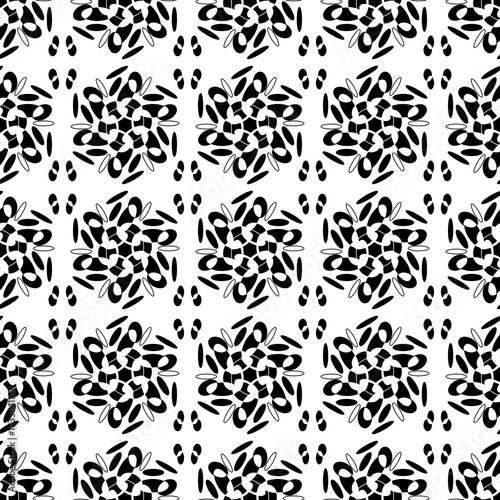Seamless abstract black floral pattern on white background.
