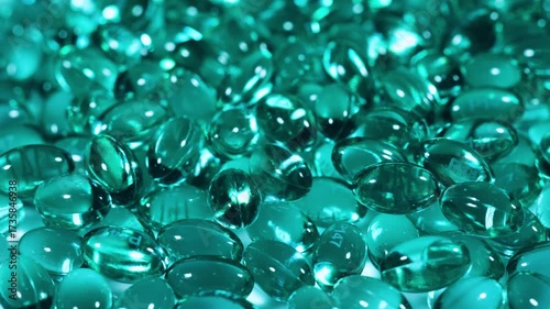 Blue capsules in the shell with liquid vitamin. Blue capsules with a dietary supplement for joints teeth and bones.