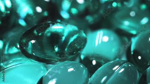 Pile of 200mg Ibuprofen Capsules for Pain Relief - Non-Prescription Anti-Inflammatory Pills Isolated on white background with shadow