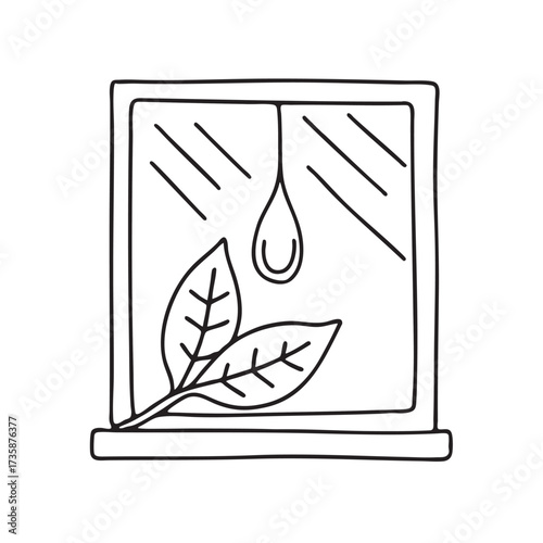 A drop of water on a leaf resting on a windowsill