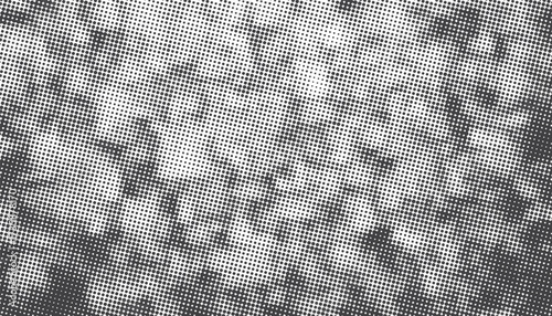  Monochrome halftone texture with a dense dot pattern creates a modern, abstract background suitable for graphic design, web, and print projects. Versatile, clean, and visually engaging