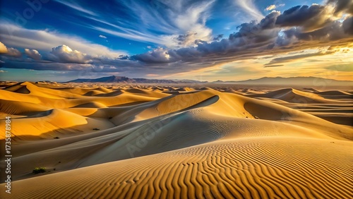 Vibrant desert landscape at sunset majestic sand dunes under a dramatic colorful sky stunning natural scenery