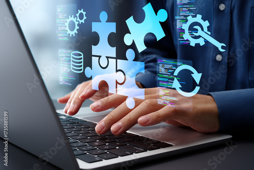 Low-code or no-code development platform. Solutions for creating software without coding. Business person using a laptop to build applications.