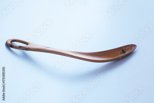 Wooden kitchen utensils stacked view close up isolated