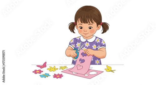Photos Cute young girl with pigtails cutting paper shapes for craft activity