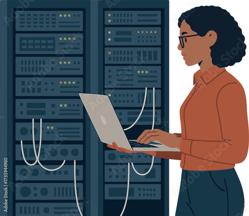 A woman engineer works in the server room of a modern data center