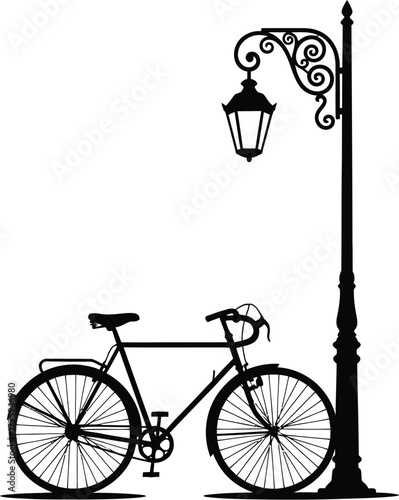 A silhouette of a bicycle parked next to an ornate street lamp, , creating a vintage or artistic scene with a classic bicycle design