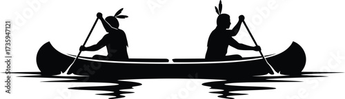 Silhouette of two Native American men in a canoe paddling on water with reflections