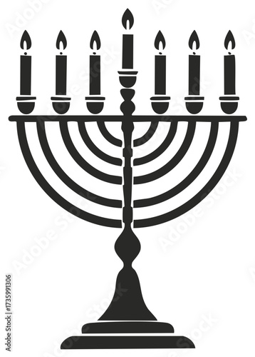 Menorah candle holder with lit candles celebrating Hanukkah in silhouette