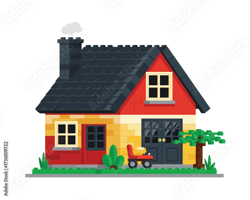 Charming red and yellow brick toy house with dark roof and chimney on white background
