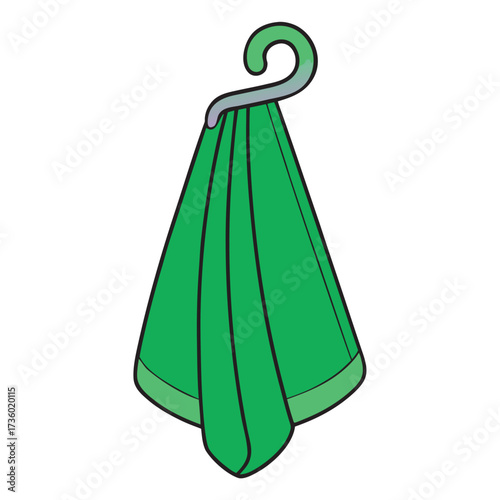 Green towel hanging on a hook in a bathroom