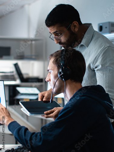 Businessman Call center, Customer Service support Trainer Coaching in customer support, telemarketing, sale at office. Male Operator in training session for Service Quality and Client Communication.