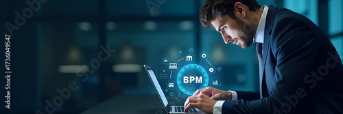 A businessman intensely focused on a laptop displaying virtual icons representing BPM, incorporating elements of efficiency, workflow management, and strategic business processes, outlined with ample 