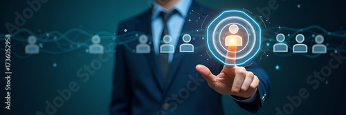 Hand selecting holographic recruitment target device with group people icons representing talent acquisition candidate selection skill assessment in empty space concept as Hand selects holographic rec