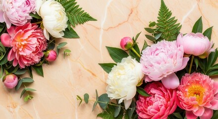 Colorful peonies and green foliage are arranged on a light marble surface Pink white and coral blooms with buds and various leaves create a vibrant border