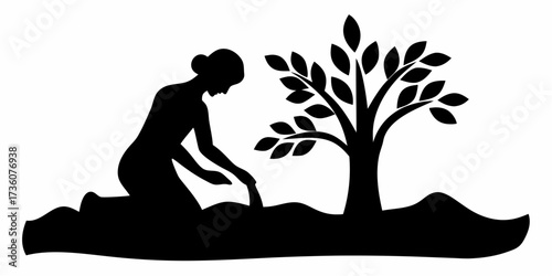 Dedicated gardener carefully plants a young tree, fostering new life and environmental stewardship for a greener planet.