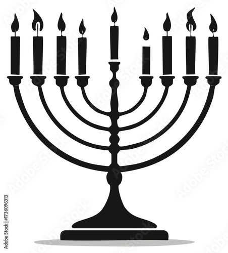 Silhouette of a nine-branched menorah with lit candles