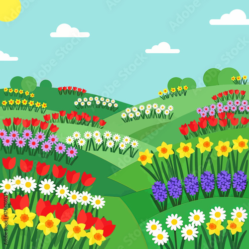A vibrant spring landscape filled with rolling green hills adorned with a diverse array of colorful blooming flowers under a clear blue sky with fluffy white clouds.