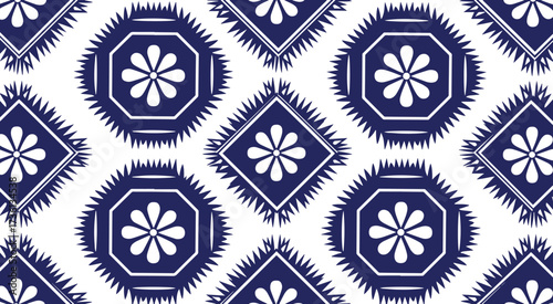 Seamless indigo pattern isolated on white background featuring stylized floral motifs within geometric shapes, creating a visually captivating and modern aesthetic