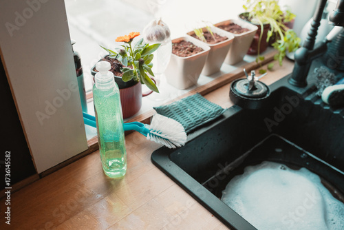 Leftover suds in the kitchen sink after washing up