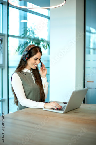 Canvas Print Customer service specialist with professional headset providing dedicated client