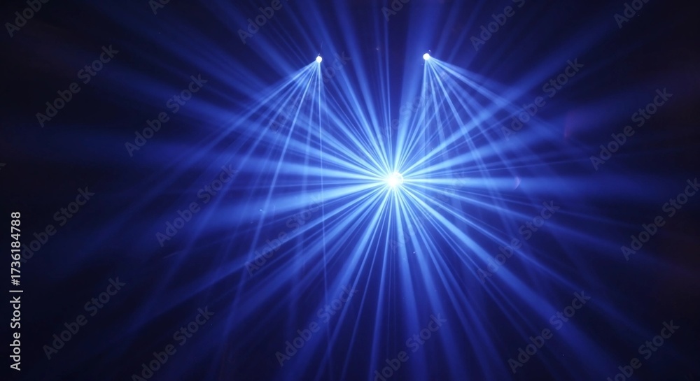Fototapeta premium Three bright spotlights shining with blue laser beams in a dark room