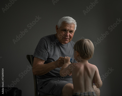 Portrait of Grandfather and Grandson in Soft Natural Light