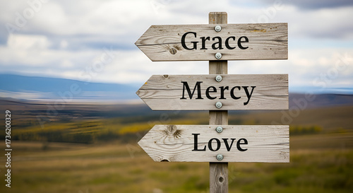 Wooden Signpost with Grace Mercy Love Arrows image