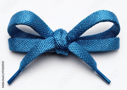 Bright teal shoelaces tied in a bow
