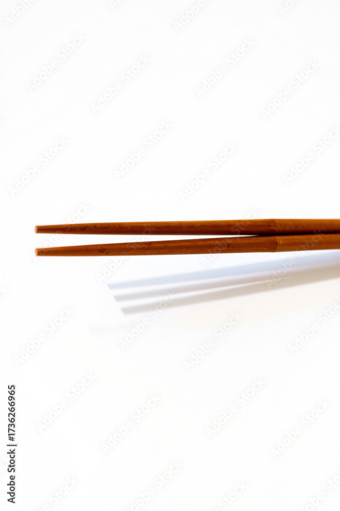 Obraz premium A Chopsticks Pair On A White Background