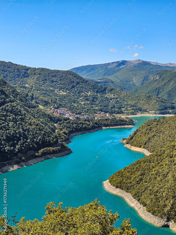 Obraz premium Scenic view of Piva Lake mountains
