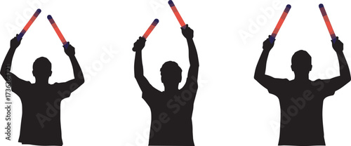 Silhouette figures holding batons, synchronized gesture, red and purple lights, signaling pose, unity in motion, event coordination, dramatic contrast, night scene, teamwork display
