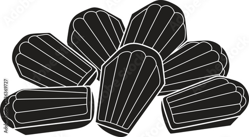 Pile of black licorice candy in the shape of coffins