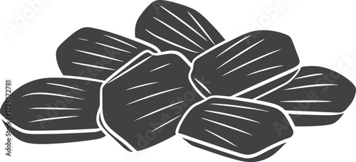 Pile of dark charcoal briquettes for grilling and barbecue