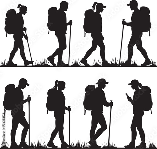 Silhouettes of hikers with backpacks and trekking poles walking