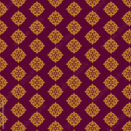 Seamless gold damask floral pattern on a deep red background, luxurious and elegant textile designs, decorative elements.